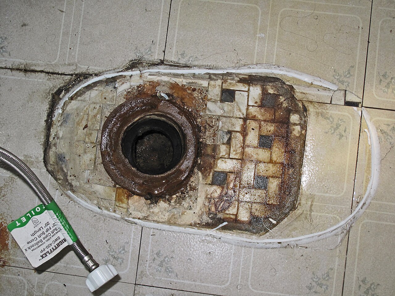 Cast iron floor drain in a basement